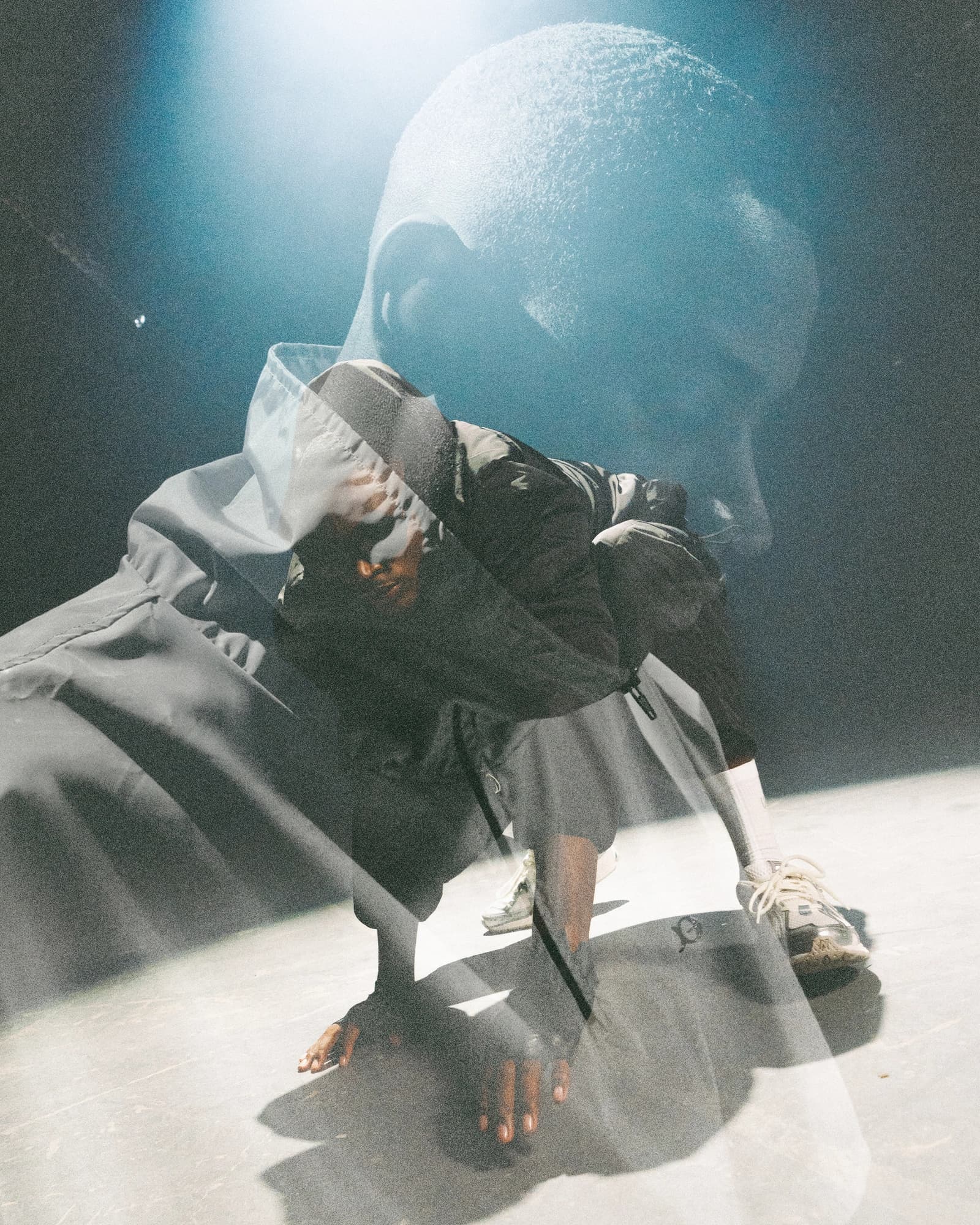 Blue double-exposure portrait from Under Gold Nova Line, photographed by Samuel Martínez
