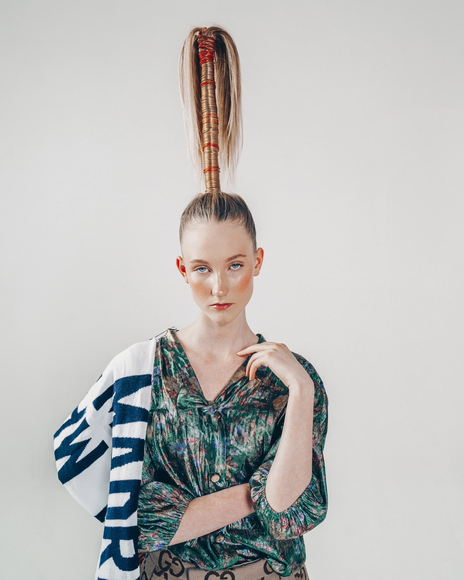 White Light editorial portrait with sculptural hair and patterned clothing, photographed by Samuel Martínez